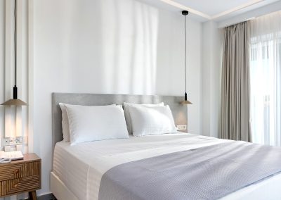 Luxury suite interior with designer lighting and modern decor, Myzith Luxury Suites, Keri, Zakynthos, Greece.